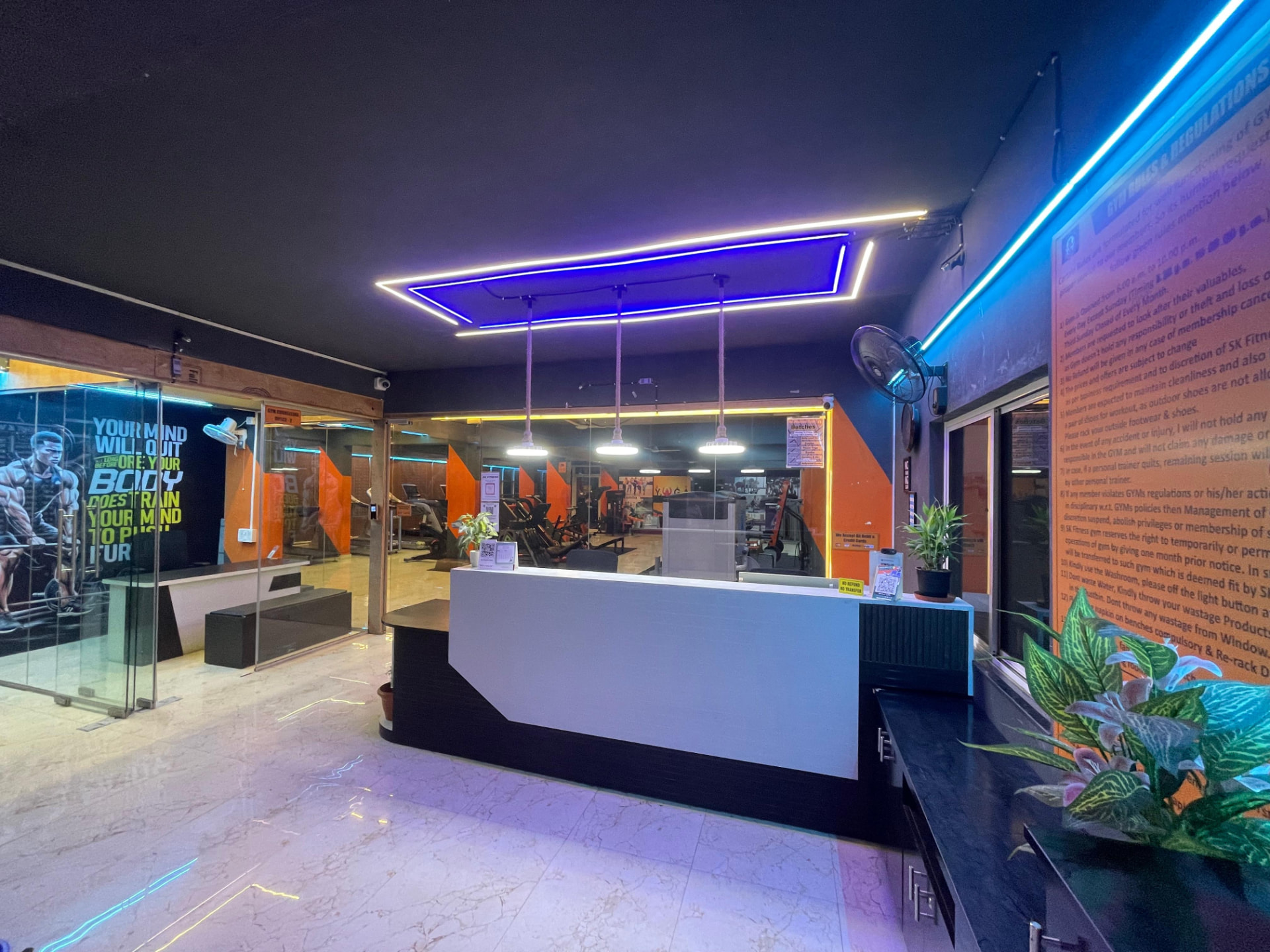 Reception desk and glass-walled office at SK Fitness Gym, Chandan Nagar, Kharadi, Pune Reception desk and glass-walled office at SK Fitness Gym, Chandan Nagar, Kharadi, Pune