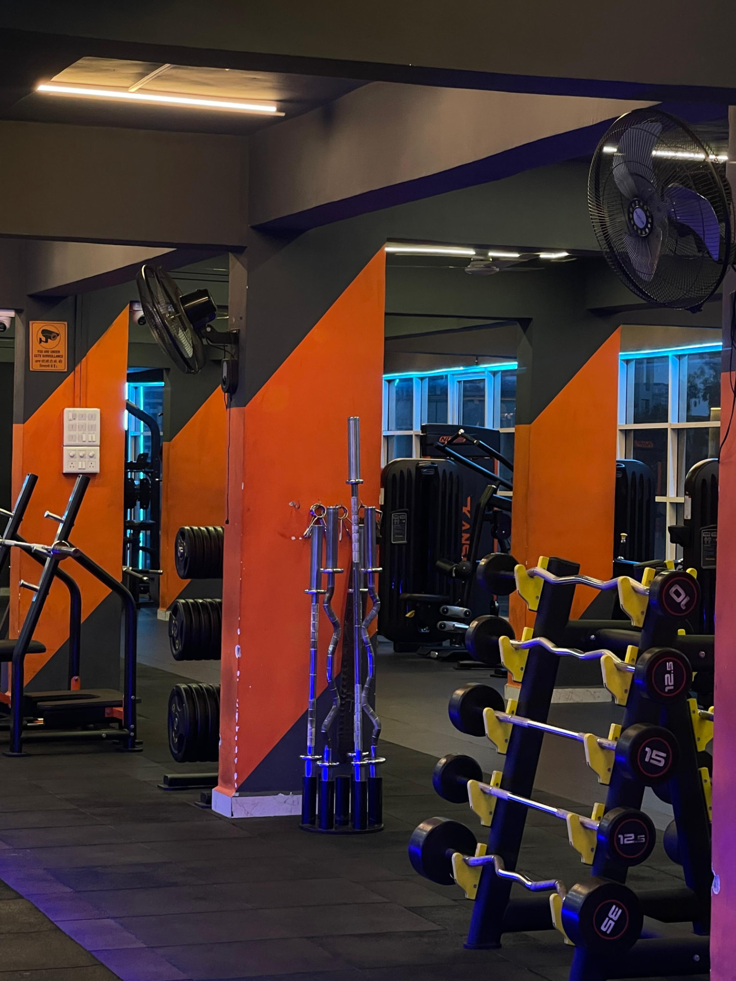 Olympic barbell and weight plate storage rack at SK Fitness Gym near Jadhav Hospital, Kharadi, Pune Olympic barbell and weight plate storage rack at SK Fitness Gym near Jadhav Hospital, Kharadi, Pune