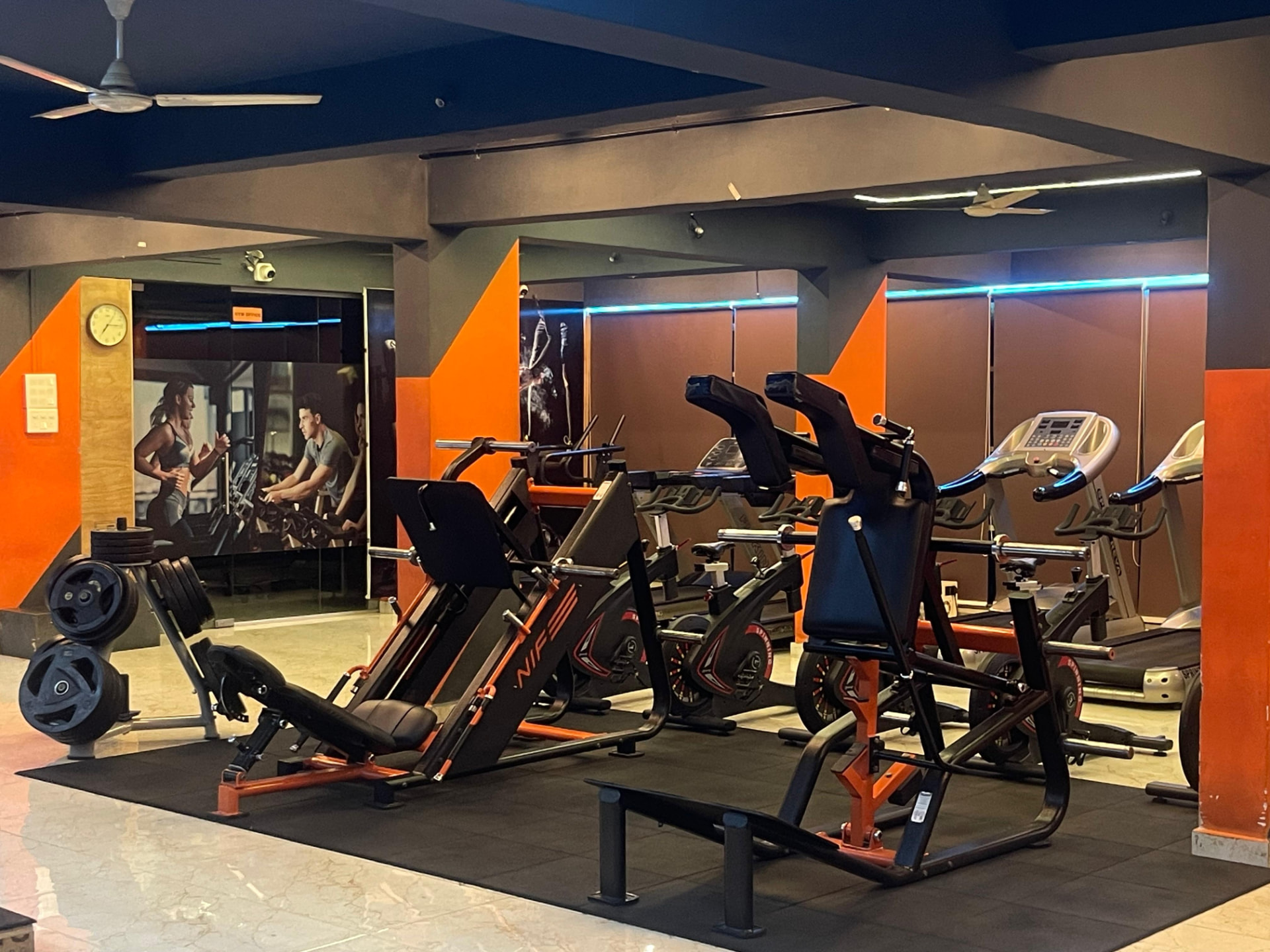 Plate-loaded leg press and strength machines on the gym floor at SK Fitness Gym Kharadi Plate-loaded leg press and strength machines on the gym floor at SK Fitness Gym Kharadi